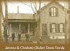 Jerome (1843-1918) Davis and second wife Charlotte Roena  Butler (1865-1925) in front of their home at 121 Beacon Avenue, New London, WI Believe the boys in the picture are Frank Irwin Davis (extreme left) and Raymond Earl Gaffaney, Charlotte's son by previous marriage. Photo taken circa 1907  Sumbitted by M. Johnson  mjohnson80@adelphia.net 